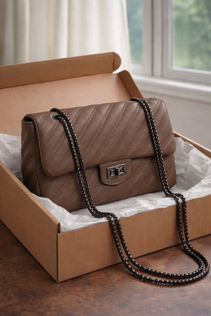 The Icon Cross body  bag